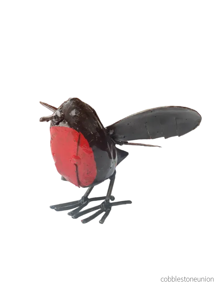 Fågel Rödhake Flygande 15 cm – Handgjord Metallskulptur från Zimbabwe Fågel Rödhake Flygande 15 cm – Handgjord Metallskulptur från Zimbabwe